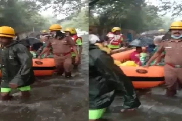 கொட்டும் கனமழை: பிறந்து 4 நாட்களேயான குழந்தை- தாயை மீட்ட வீரர்கள்