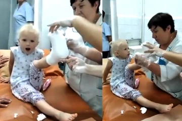 காலில் கட்டு போடும்போது வலியை மறந்து தேசிய கீதம் பாடிய உக்ரைனிய சிறுமி! மனதை உருக்கும் வீடியோ