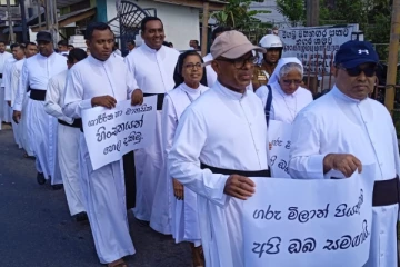 அருட்தந்தை தாக்கப்பட்டமைக்கு கவனயீர்ப்பு ஆர்ப்பாட்டம்
