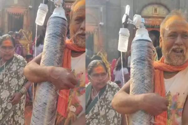 மனைவிக்காக ஆக்சிஜன் சிலிண்டர் சுமந்தபடியே கோவிலுக்கு சென்ற கணவர் | Devotee Couple Bring Oxygen Cylinder For Darshan