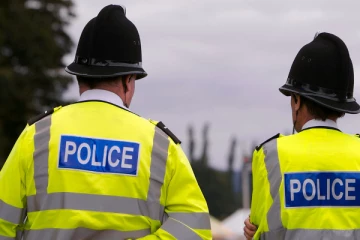 பிரித்தானிய உள்துறைச் செயலருக்கு பொலிசார் எச்சரிக்கை: பின்னணி