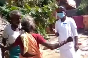 சாமிக்குத் கொரொனா தடுப்பூசி ஆகாது; அதிகாரிகளை விரட்டியடித்த  மூதாட்டி!