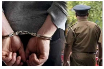 பெண்ணிடம் இலஞ்சம் பெற்ற கிராமசேவை அதிகாரி கைது