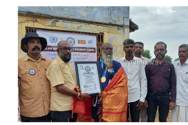 யாழில் வித்தியாசமான உலக சாதனையை படைத்த நபர்! (Photos) | Jaffna Man Achieved Pulling Vehicle With His Beard