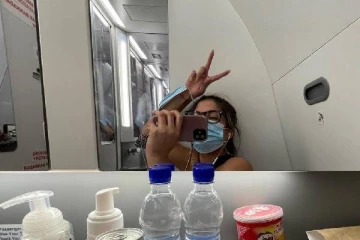 சுவிஸ் பயணத்தினிடையே உறுதியான தகவல்: விமான கழிவறையில் தனிமைப்படுத்திக்கொண்ட பெண்