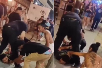 பொலிசார் ஒருவரை கைது செய்யும்போது இளம்பெண் செய்த மோசமான செயல்: கமெராவில் சிக்கிய காட்சி