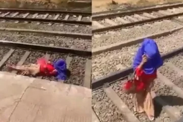 இந்தியாவில் தான் இப்படிலாம் நடக்கும்., ஓடும் ரயிலுக்கு அடியில் தண்டவாளத்தில் கூலாக படுத்திருந்த பெண்!