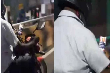 எனக்கு உயிரை விட சீரியல்தாம்பா முக்கியம்.... போனில் சீரியல் பார்த்துக்கொண்டே பைக் ஓட்டிய நபர்!