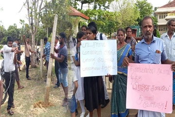 யாழில் எதிர்ப்பின் மத்தியில் ஊர் வீதியை போராடி மீட்ட பொதுமக்கள் (Photos)