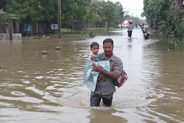 கிளிநொச்சியில் மழையால் பாதிக்கப்பட்ட ஆயிரக்கணக்கான குடும்பங்கள்