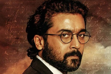 சூர்யாவின் புதிய கெட்டப் துபாய்யில் ரசிகருடன் அவர் எடுத்துக்கொண்ட புகைப்படம்..