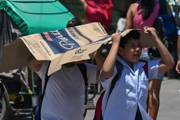 வெப்ப காலநிலையால் மூடப்பட்ட நூற்றுக்கணக்கான பாடசாலைகள்