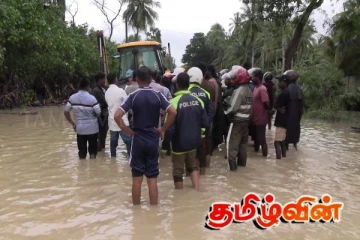 கிளிநொச்சியில் சட்டவிரோதமாக அமைக்கப்பட்ட மதில் அகற்றி வெள்ளநீர் வெளியேற்றம்