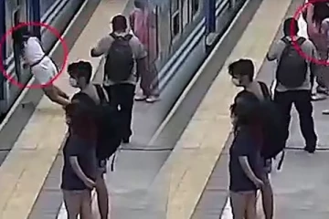 ஓடும் ரயிலுக்கடியில் மயங்கிச் சரிந்த இளம்பெண்... மறுபிறவி எடுத்து வரும் ஆச்சரிய காட்சி