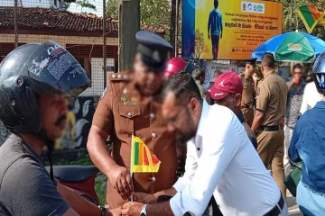 கைதியிடம் இலஞ்சம் கேட்ட பொலிஸ் அதிகாரிகள் கைது- பணத்தை தேடிச் சென்ற இடத்தில் காத்திருந்த அதிர்ச்சி