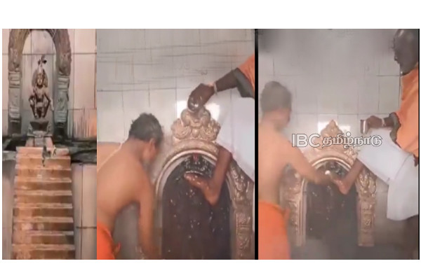 lord-ayyappa-foot-on-the-head-anointed-priest