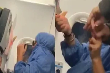 விமானத்தில் சிகரெட் பிடித்த பெண் பயணி ; சமூக வலைதளங்களில் வைரலாகிய வீடியோ