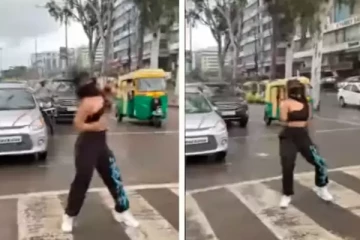 நடுரோட்டில் அரைகுறை ஆடையுடன் நடனமாடிய இளம்பெண்! தீயாய் பரவும் வீடியோ