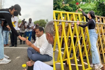 හරීන්ට මලක් දෙන තරුණියක් ගැන සමාජ මාධ්ය කැළඹෙයි..පොලිසියට මල දුන් තරුණියට මළපනී(VIDEO/PHOTOS)