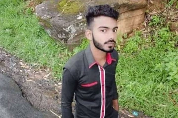 தேடுவாரற்றுக் கிடந்த பாதணி  மற்றும்  ஸ்மாட் போன்;  நீர்தேக்கத்தில் இளைஞனின் சடலம்