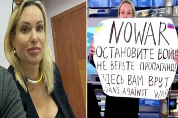 ரஷ்ய தொலைக்காட்சியில் போருக்கு எதிராக பதாகை காட்டிய பெண்ணுக்கு அபராதம்