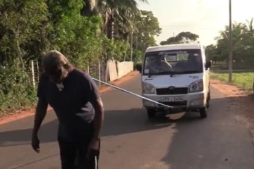 யாழில் தாடியினால் வாகனத்தை இழுத்து சாகசம்