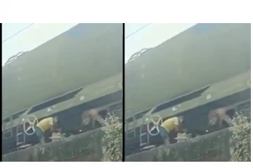 ஓடும் சரக்கு ரயிலிலிருந்து எண்ணெய் திருடும் இளைஞர்கள் - வைரலாகும் வீடியோ...!