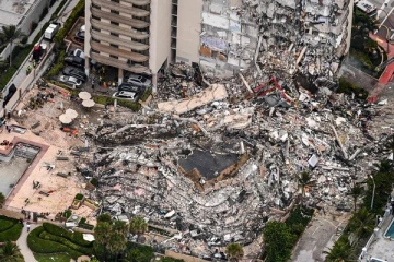 தரைமட்டமான 12 மாடி கட்டிடம்... இடிபாடுகளிடையே கேட்ட அலறலும் விரல் அனக்கமும்