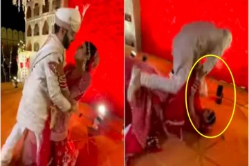 போட்டோவுக்காக கீழே விழுந்து மண்ணை வாரிய தம்பதிகள்! வைரல் வீடியோ