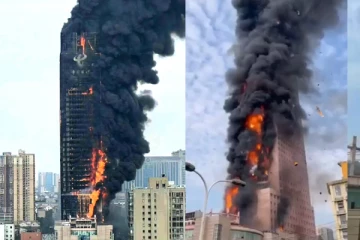 சீனாவில்  715 அடி உயர வானளாவிய கட்டிடத்தில் தீ விபத்து; நெருப்பும் புகையுமாக இணையத்தில் வெளியான காட்சிகள்