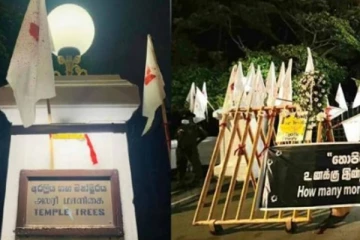 අරලිය ගහ මැදුර ඉදිරිපිටට ආ සුදු කොඩි සහ මල්වඩම්.. (PHOTOS)