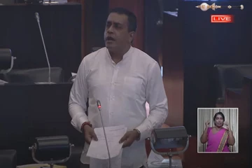 அமைச்சா் விமல் வீரவன்ச, ”தெக்கே மேன்”( இரட்டை மனிதன்). நாடாளுமன்றத்தின் இன்றைய முக்கிய உரைகள்.