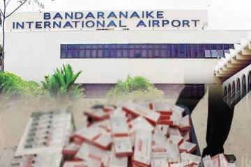 வெளிநாட்டு சிகரட்டுகளுடன் விமான நிலையத்தில் சிக்கிய பெண்