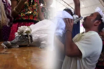 உதட்டில் முத்தம் கொடுத்து பெண் முதலையை திருமணம் செய்த மேயர்..!