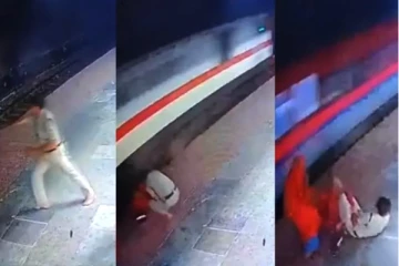 தண்டவாளத்தை கடக்கும் பெண்ணை உயிரை பணயம் வைத்து காப்பாற்றிய காவலர்