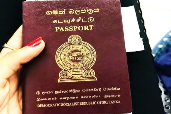 குடிவரவு திணைக்களத்தின் அலுவலக பெண் உதவியாளர் அதிரடியாக கைது! | Female Officer Arrested Passport Office