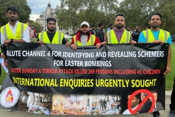 ஈஸ்டர் தாக்குதலுக்கு நீதி கோரி பிரிட்டனில் கவனயீர்ப்பு போராட்டம் (படங்கள்)