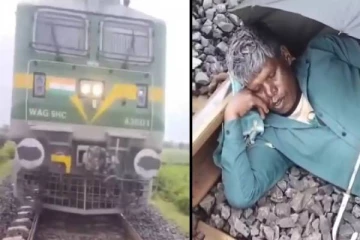 தண்டவாளத்தில் குடை பிடித்து தூங்கிய நபர்.., ரயிலை நிறுத்தியதால் அசம்பாவிதம் தவிர்ப்பு