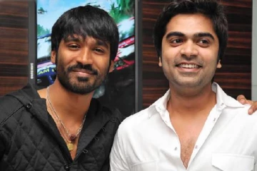 திருமண நிகழ்ச்சியில் சந்தித்து கட்டியணைத்துக்கொண்ட தனுஷ் சிம்பு... வைரலாகும் போட்டோஸ்