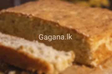 කේක් ගෙඩියකින් කුකුළු පිහාටුවක් මතු වෙයි..රජයේ පිරිසකට දැඩි චෝදනා..