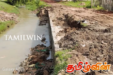 இடிந்து வீழ்ந்த கிளிநொச்சி இரணைமடுக் குளத்தின் கொங்கிறீட் சுவர்