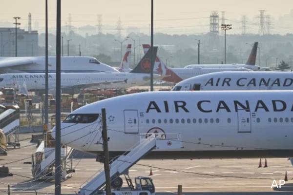 ஏர் கனடா நிறுவனத்துக்கு சுவிஸ் புலம்பெயர்தல் அமைப்பு அபராதம் | Sem Fined Air Canada For Flouting Swiss Rules