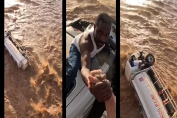 ஆற்றின் வெள்ளப்பெருக்கில் சிக்கிய டிரைவர் - உயிரை பணயம் வைத்து காப்பாற்றிய விமானி