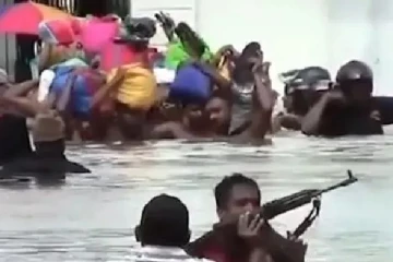 சிறைக்குள் புகுந்தது வெள்ளம் : துப்பாக்கிமுனையில் வெளியேற்றப்பட்ட கைதிகள்