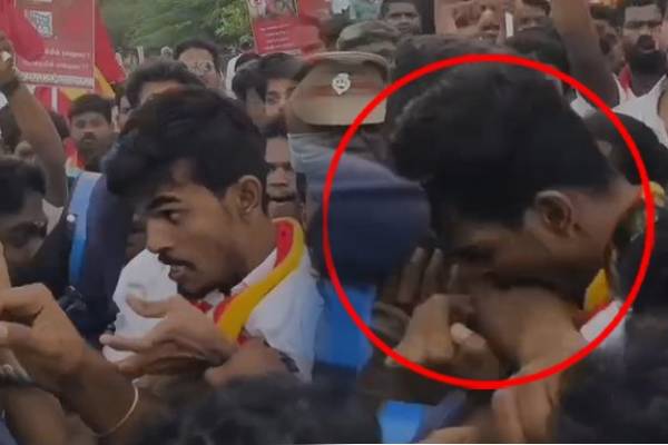 ஆர்ப்பாட்டத்தின்போது பொலிஸாரின் கையை கடித்த தவெக தொண்டர் | Tvk Volunteer Bit A Police Officers Hand