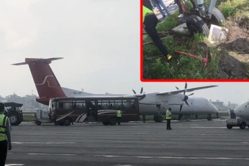 ஓடுதளத்தை விட்டு புல்தரையில் சிக்கிய விமானத்தால் பரபரப்பு