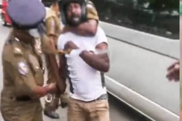 எரிபொருள் நிலையத்தில் குழப்பம்! பொதுமகனை கடுமையாக தாக்கும் பொலிஸார்