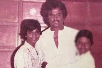 ரஜினியை கட்டிப்பிடித்து கொண்டு நிற்கும் இந்த சிறிய வயது தமிழ் சினிமா நட்சத்திரம், யார் தெரியுமா?