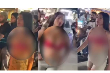 சாலையில் அரை நிர்வாணத்துடன் நடந்த இளம்பெண்- ஆடிப்போன மக்கள்.. வைரலாகும் வீடியோ!