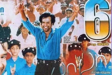 இந்த புகைப்படத்தில் ரஜினிகாந்துடன் இருக்கும் முன்னணி நட்சத்திரம் யாரென்று தெரிகிறதா.. இதோ பாருங்க